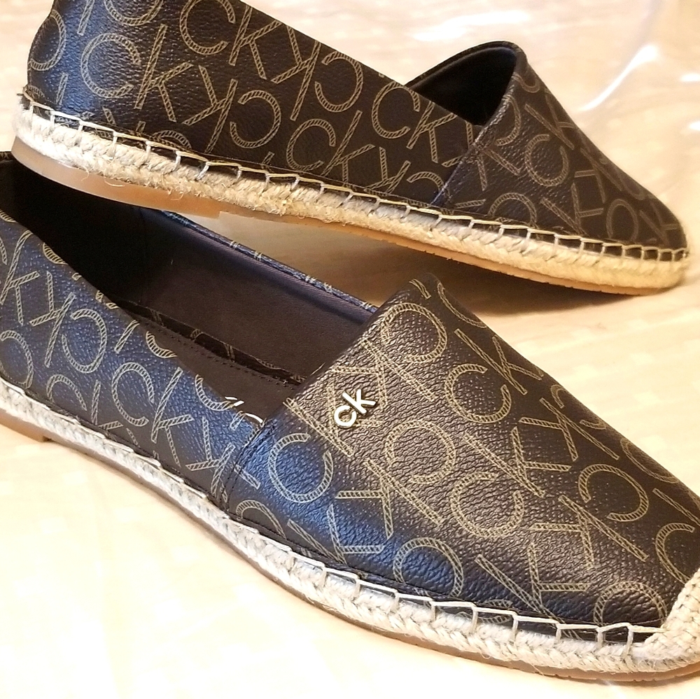 Calvin Klein monogram brown slip on flats